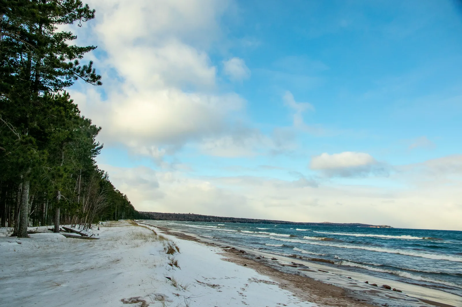 Great Lakes shoreline in winter — Michigan winters bring lake-effect snow, ice storms, and real cold-weather injury risks